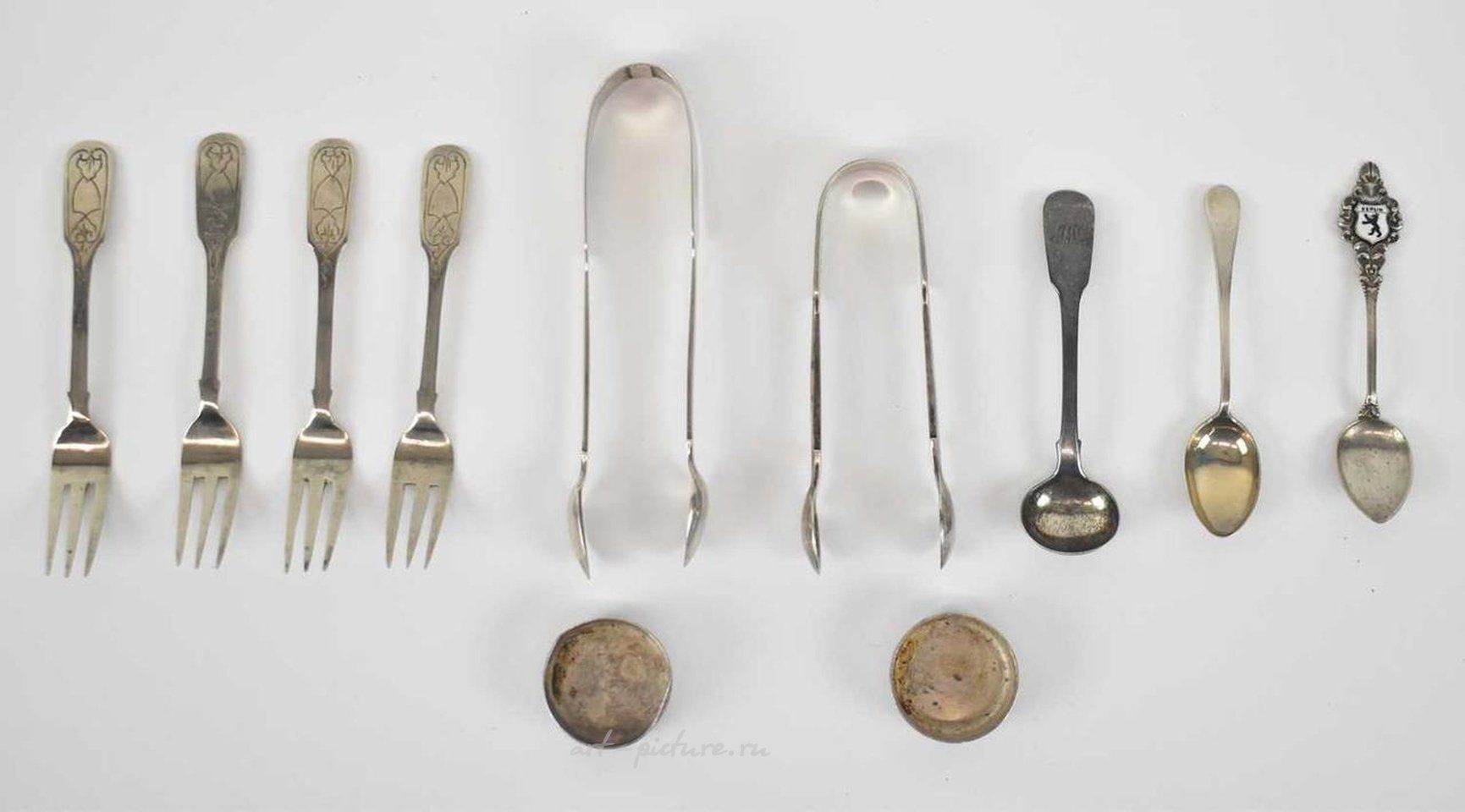 Русское серебро , Набор из четырех разнообразных серебряных ложек с клеймами
