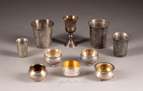 Russian silver, A COLLECTION OF A SILVER AND NIELLO BEAKER AND SEVEN SPOONS