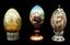 Русское ювелирное эмальное яйцо с серебряным покрытием, украшенное драгоценными камнями, состоящее из двух частей...