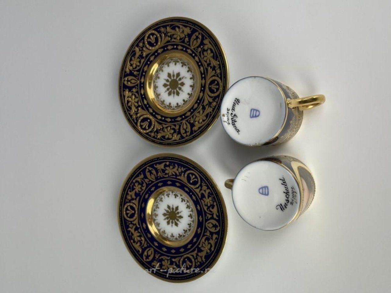 Royal Vienna Porcelain , PAIR OF ROYAL VIENNA PORTRAIT DEMI-TASSE CUP AND SAUCER