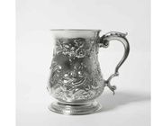 Silver mug, richly decorated with a floristic pattern.England, London, 1760.