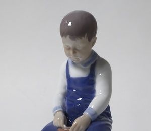 A boy with a bucket