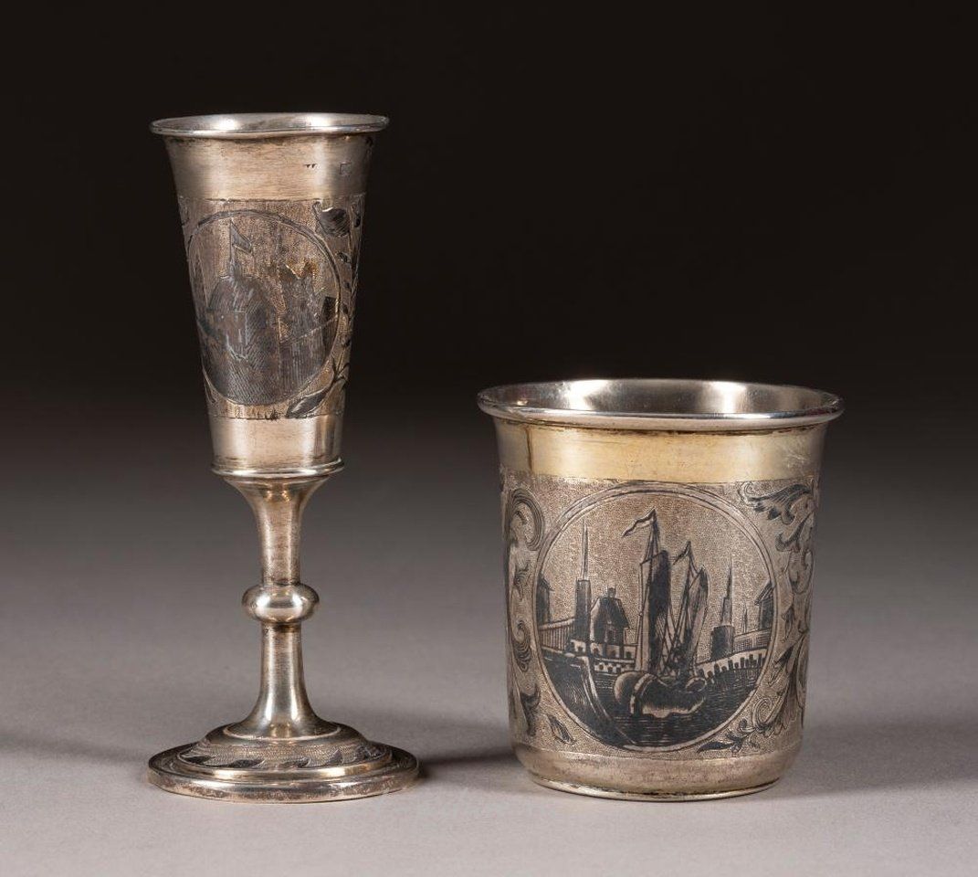 Russian silver , A COLLECTION OF A SILVER AND NIELLO BEAKER AND SEVEN SPOONS