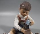 Porcelain figurine "Boy with cubes".Dahl-Jensen.