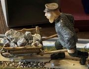 Author's sculpture made of stone "mining", Ural school of volumetric mosaics