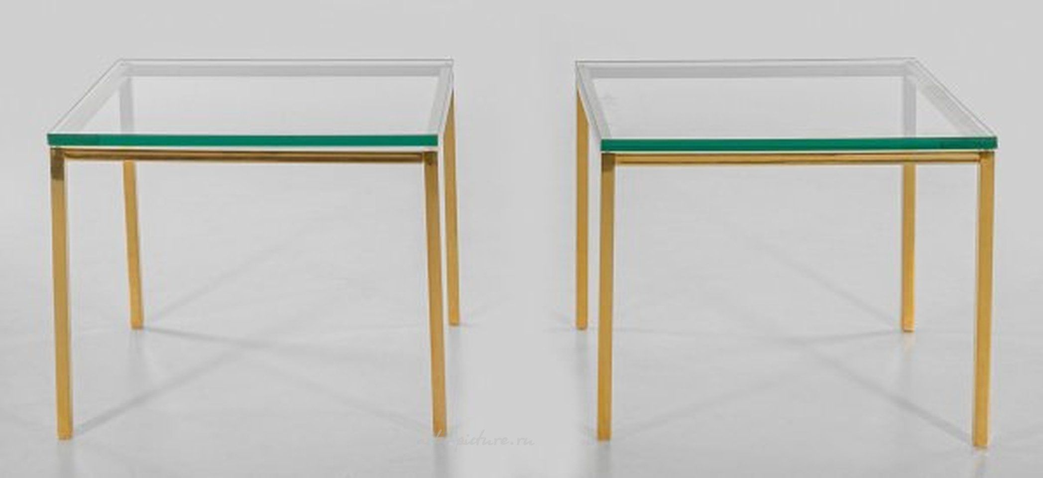 A pair of side tables