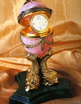 buy Faberge egg Faberge with a pink quartz clock in the Empire style.