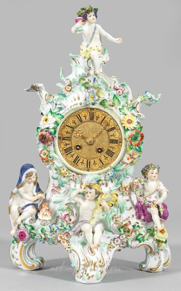 "Exquisite porcelain clock adorned with allegories of"