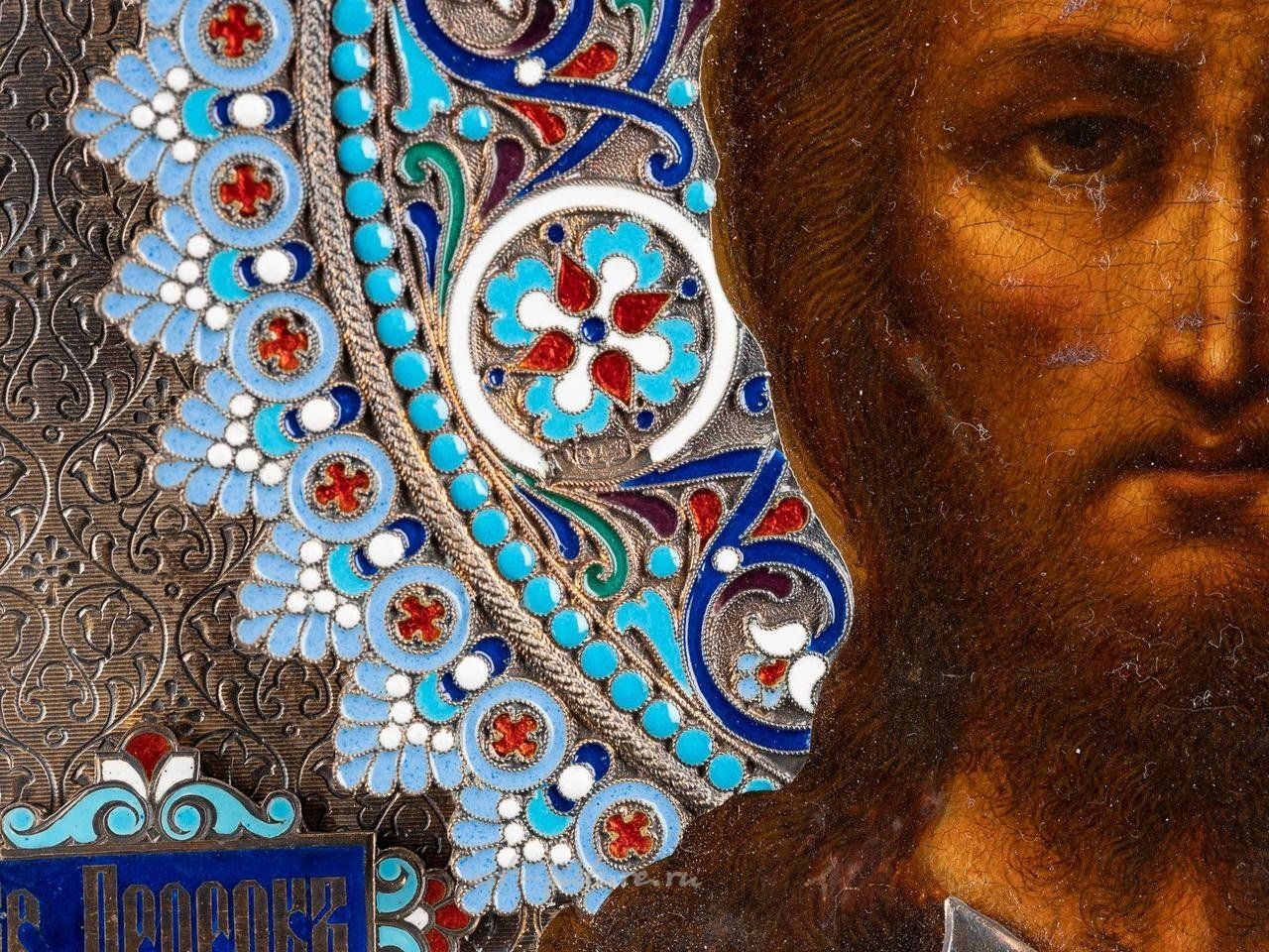Russian silver , AN ICON SHOWING ST. JOHN THE FORERUNNER WITH A SILVER-GILT