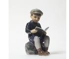 Porcelain figurine Reading Boy, Dahl-Jensen