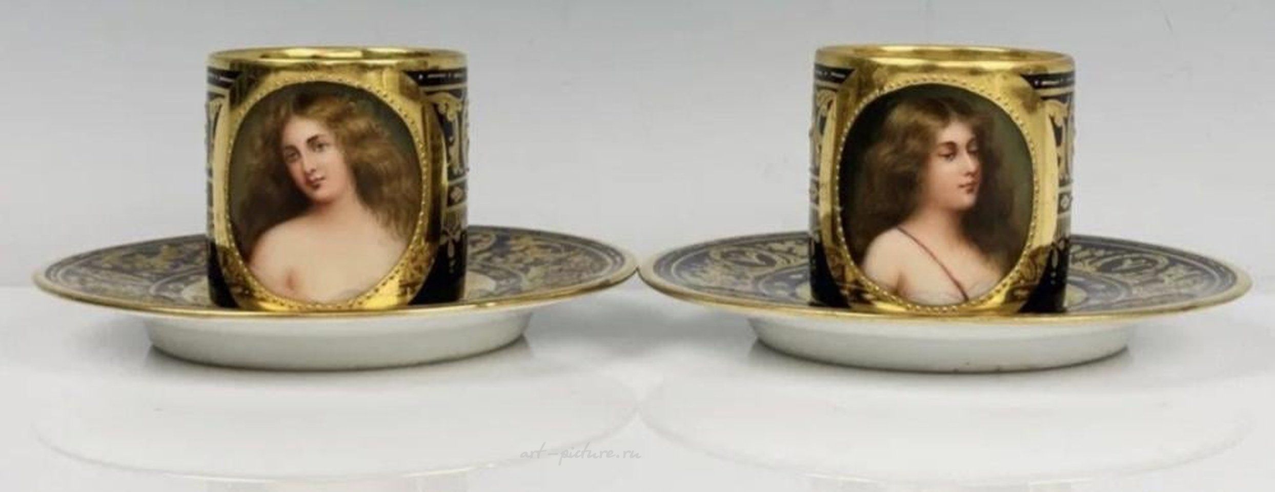 Royal Vienna Porcelain , A PAIR OF ROYAL VIENNA PORTRAIT DEMITASSE CUPS & SAUCER