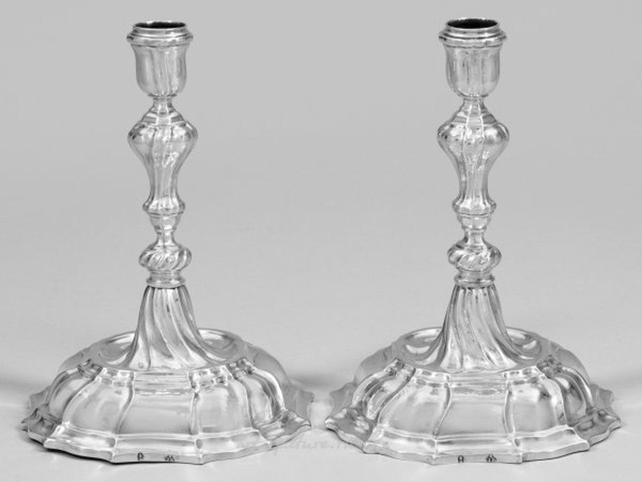 A couple of Baroque table candelabras