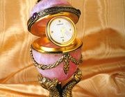 Faberge egg Faberge with a pink quartz clock in the Empire style.