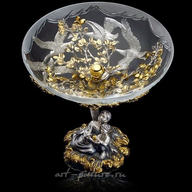 The translation of "Ваза «Гуси-Лебеди»" into English is "Vase 'Geese-Swans'."