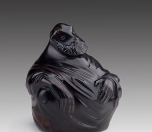 The philosopher. Stone-cutting sculpture, Stone-cutting art, The work of a master. obsidian