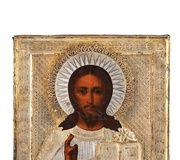 Икона, изображающая Христа с частично серебряной ризой...