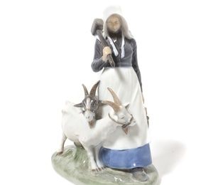 Girl with goats