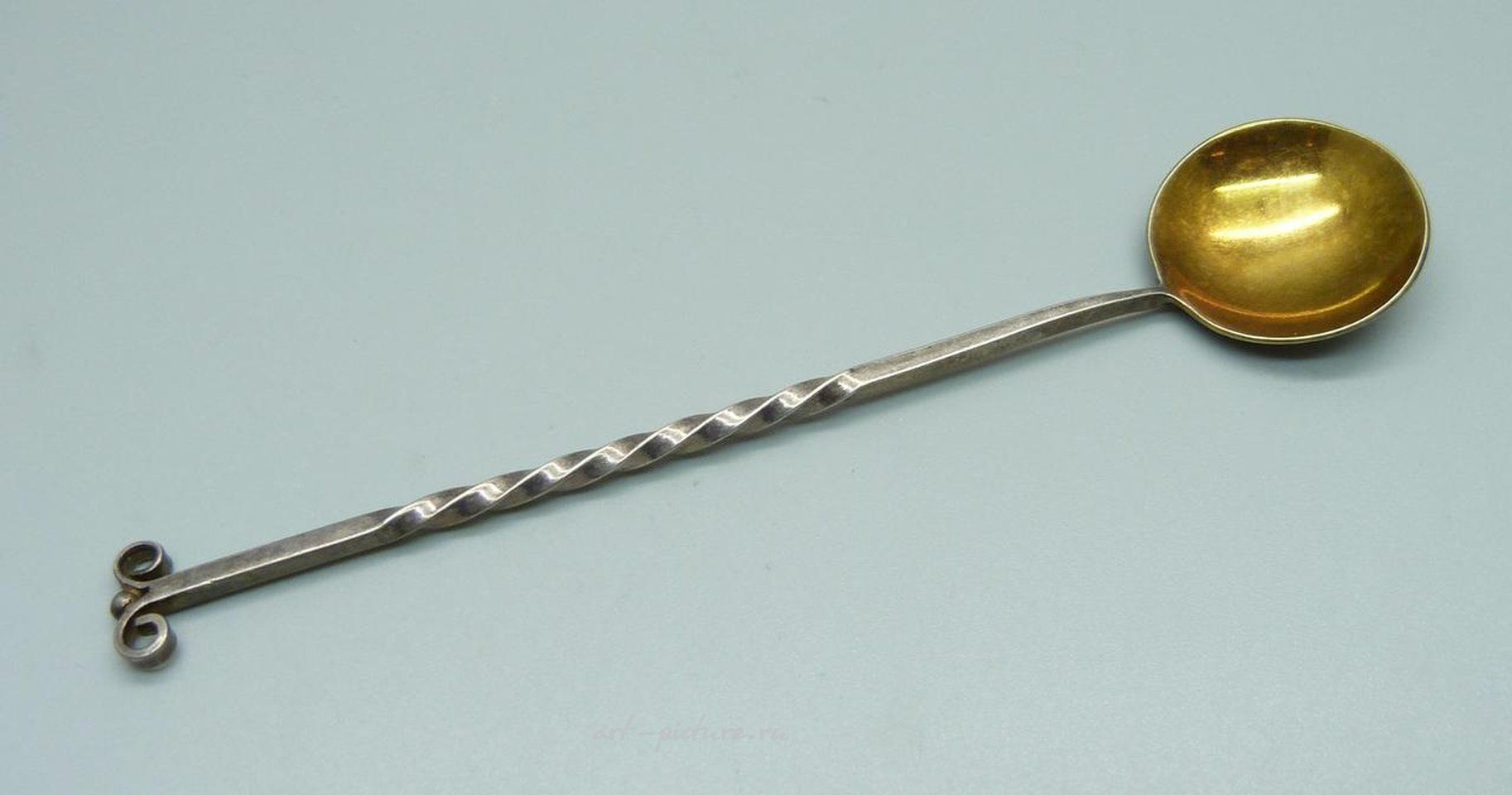 Russian silver , A white metal apostle spoon, (tests as silver),