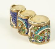 Coin holder with three compartments.