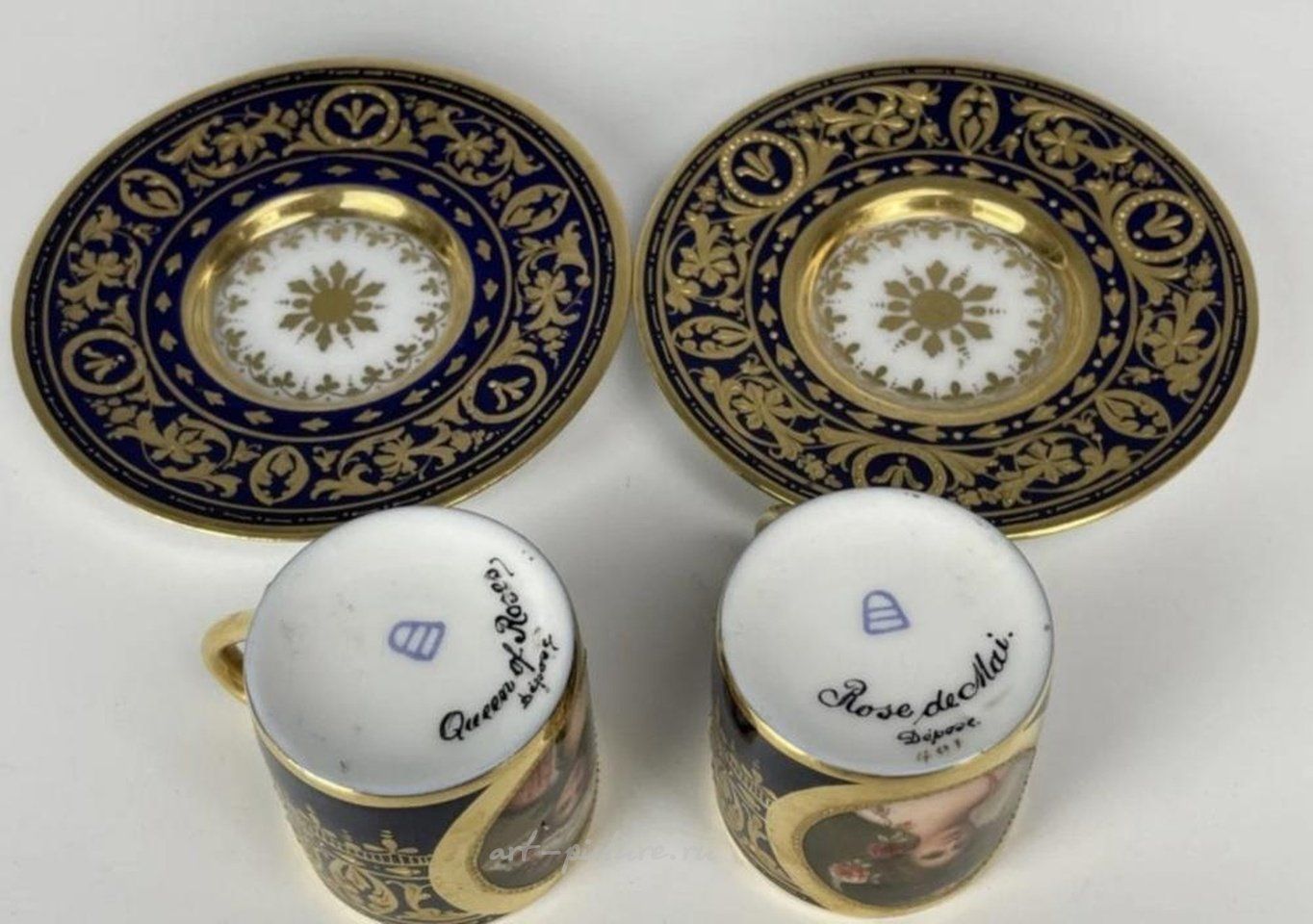 Royal Vienna Porcelain , A PAIR OF ROYAL VIENNA DEMI- TASSE CUPS & SAUCERS