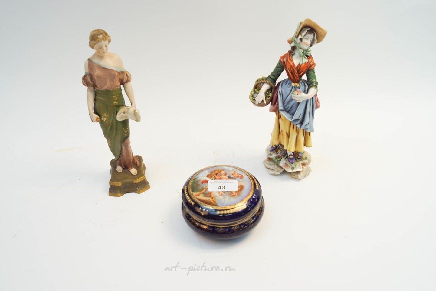 Royal Vienna Porcelain , A Meissen style figure, a Royal Dux figure and a Vienna styl...