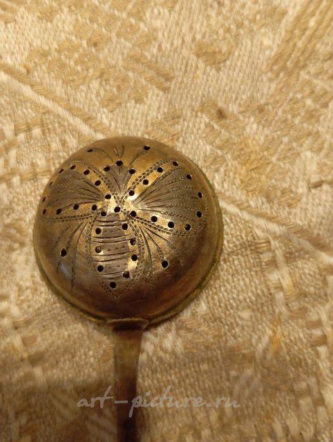 Antique silver strainer spoon with gold plating
