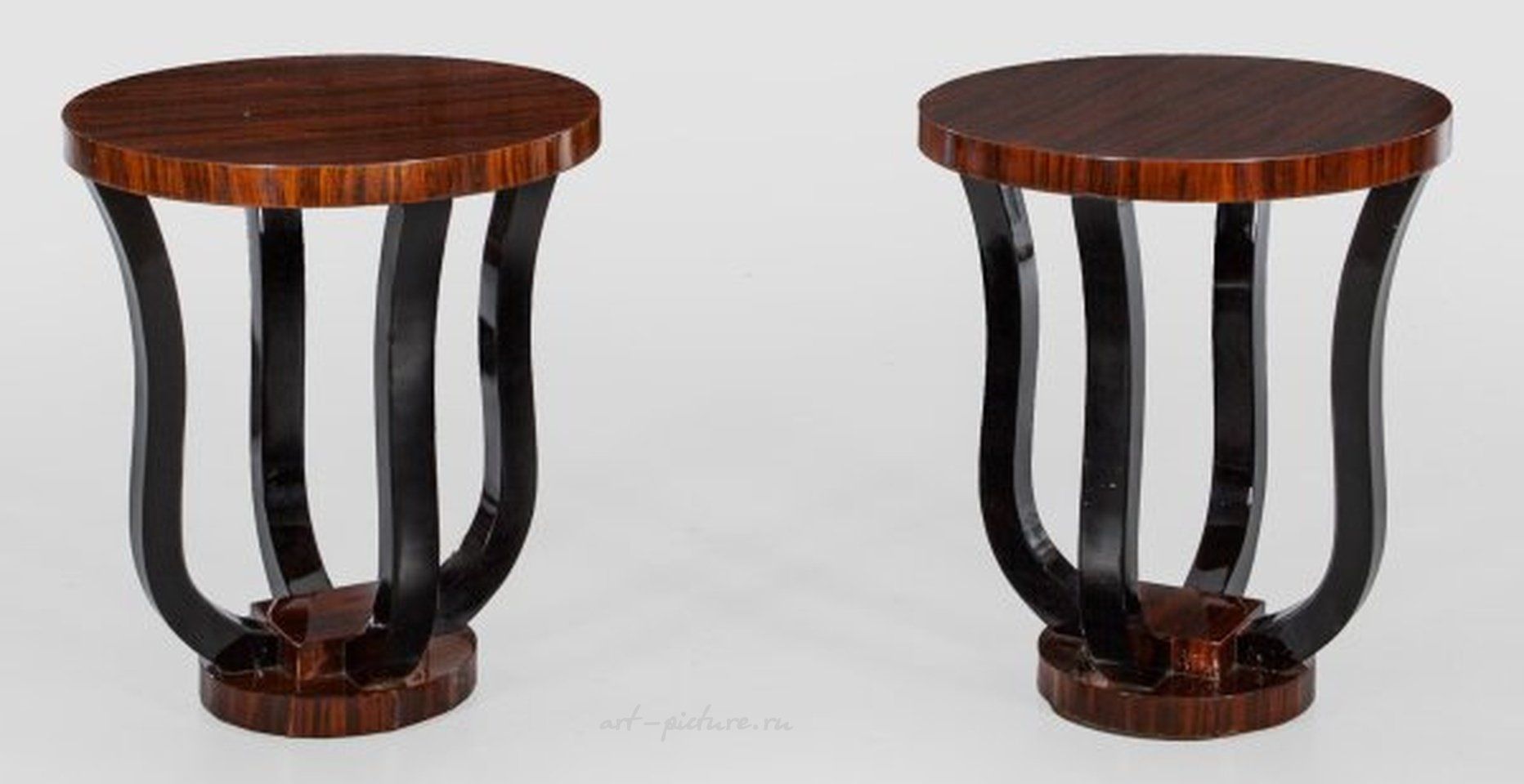 A couple of side tables in the Art Deco style.