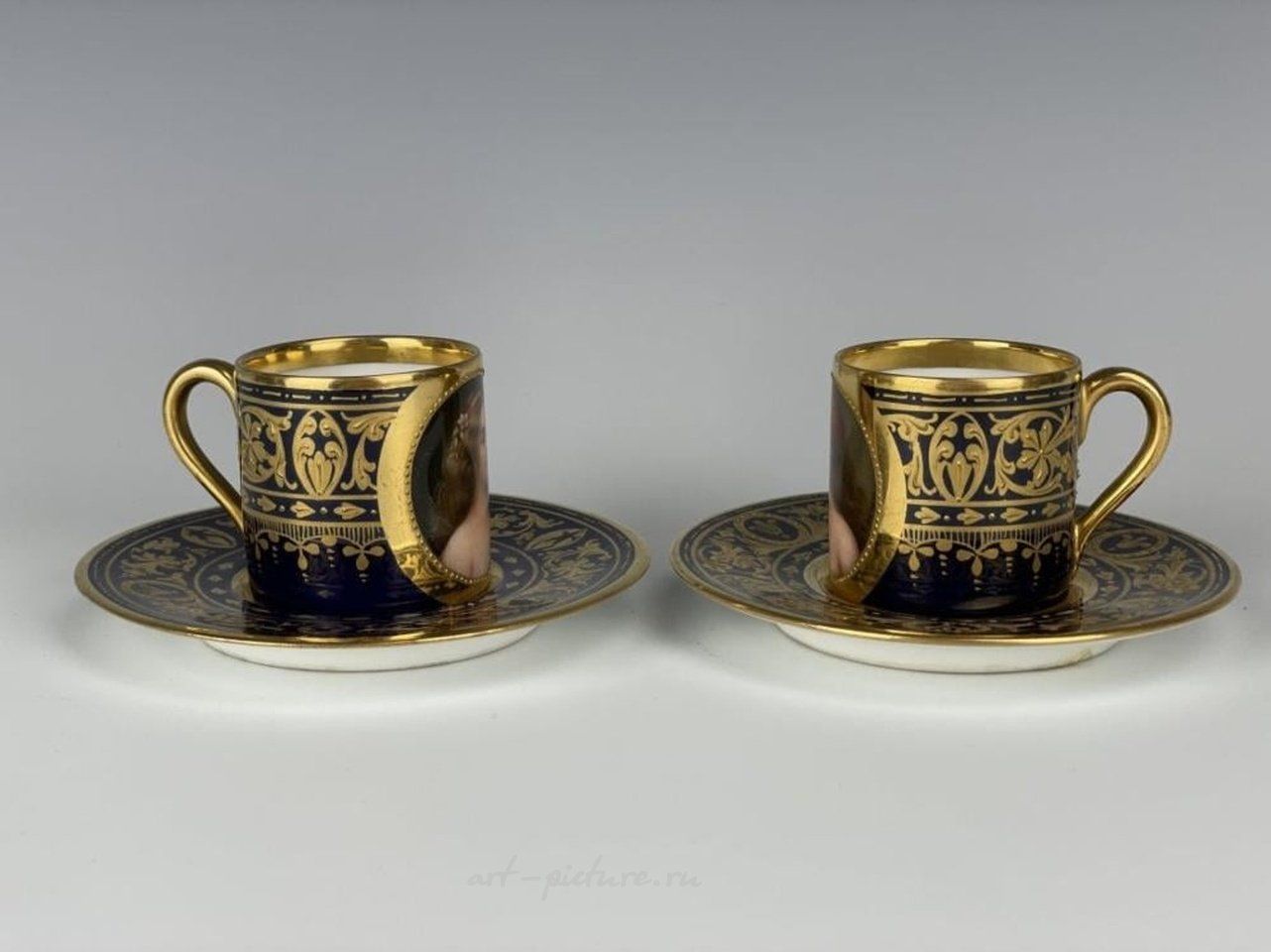 Royal Vienna Porcelain , PAIR OF ROYAL VIENNA PORTRAIT DEMI-TASSE CUP AND SAUCER