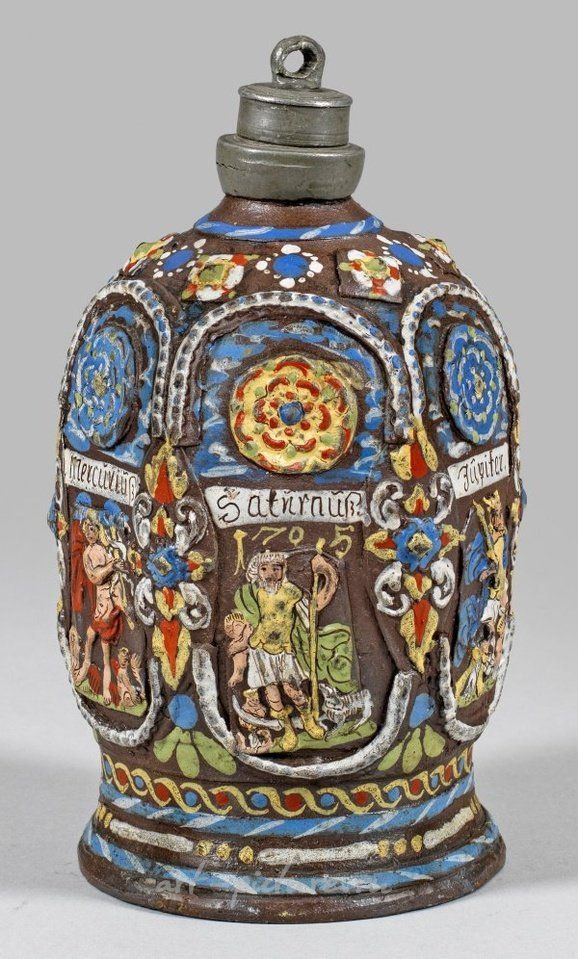 Rare Kreussen screw bottle with planetary representations.