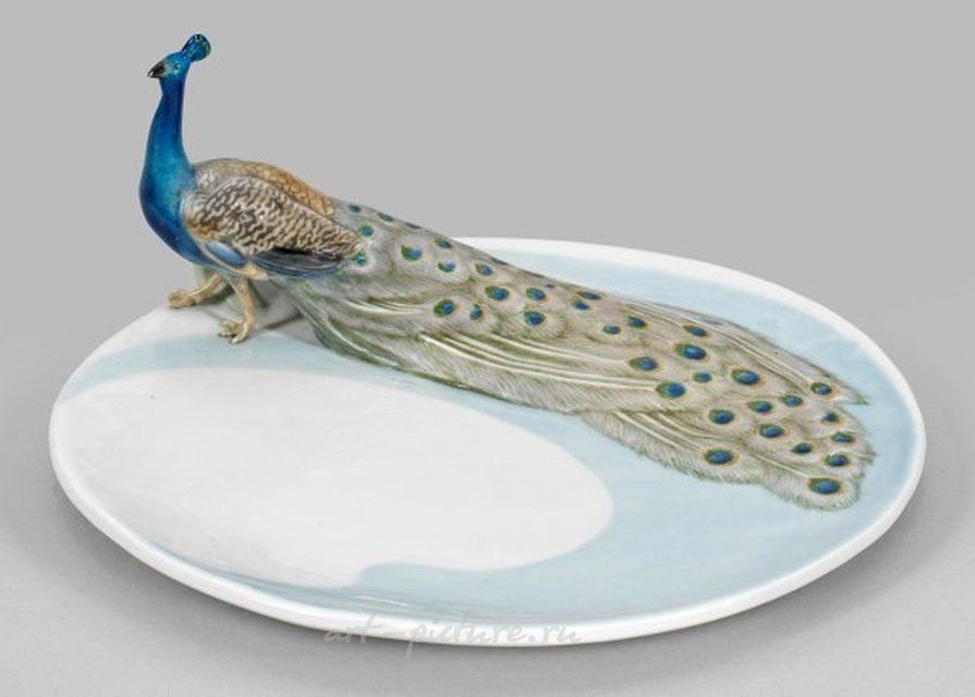 Art Nouveau-style dish with peacock figurine