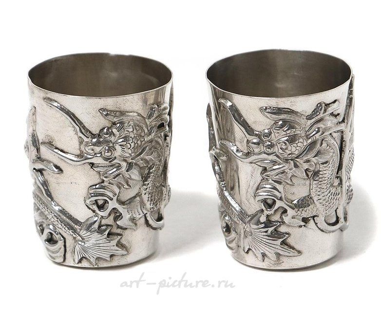 Silver cups with dragons, 2 pcs. China, late 19th - early 20th century.